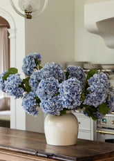 fake blue hydrangea arrangement