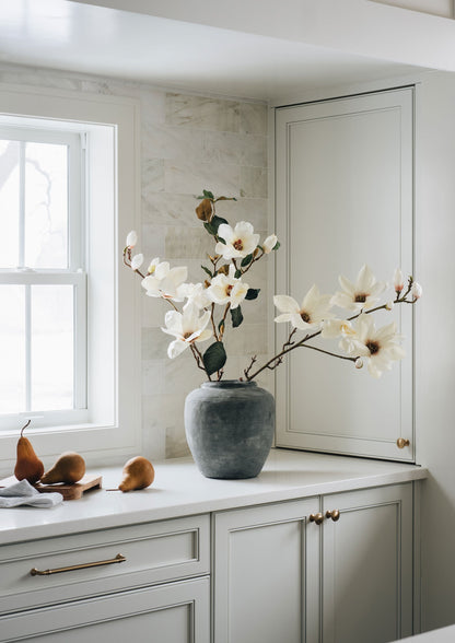 Distressed Concrete Vase with Magnolia Branches