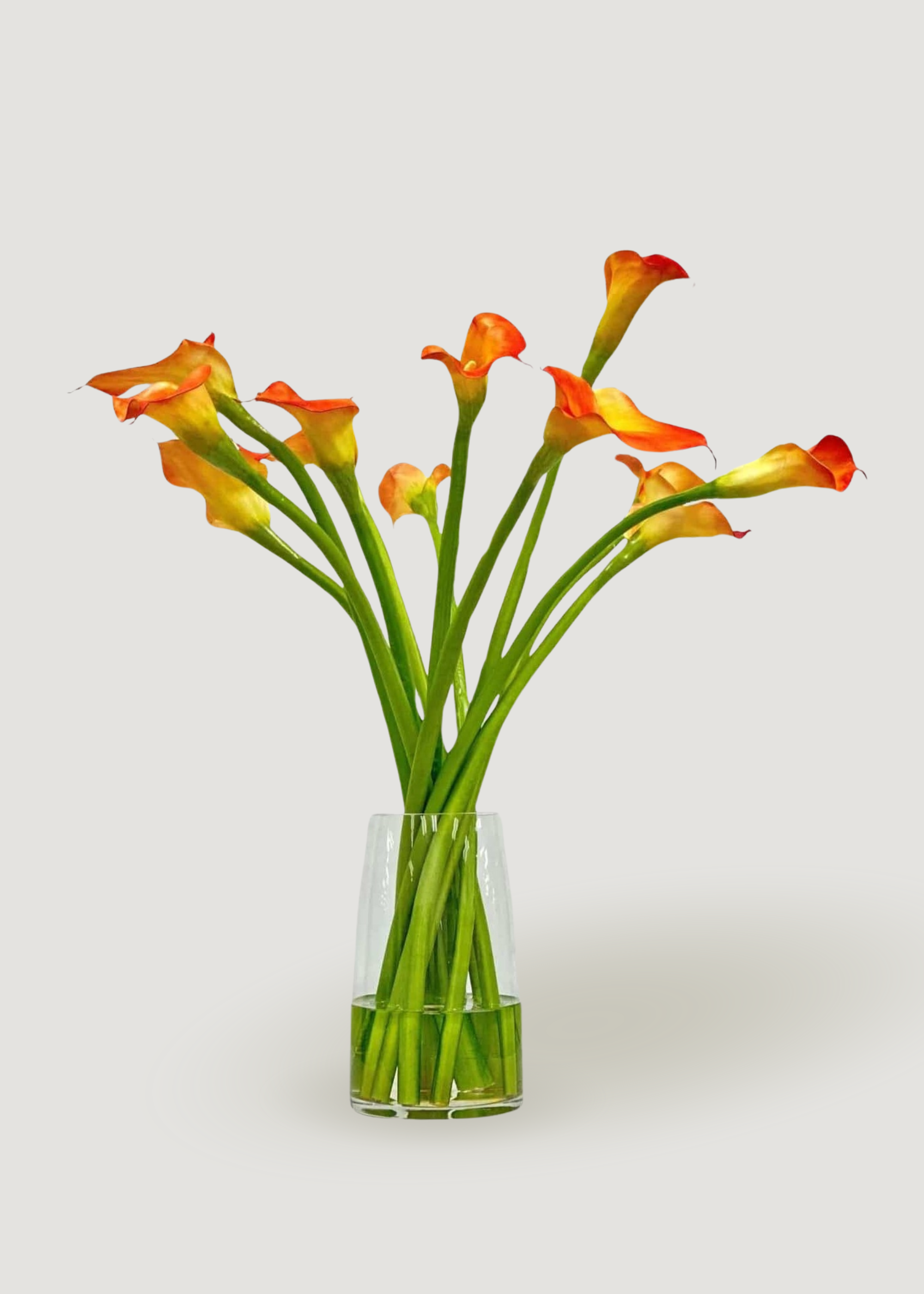 Orange Artificial Calla Lily Arrangement in Glass Vase 