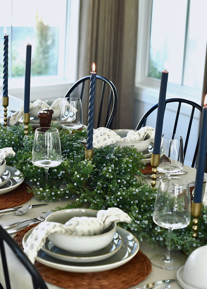 Decorative Holiday Table with Candles and Juniper Garland