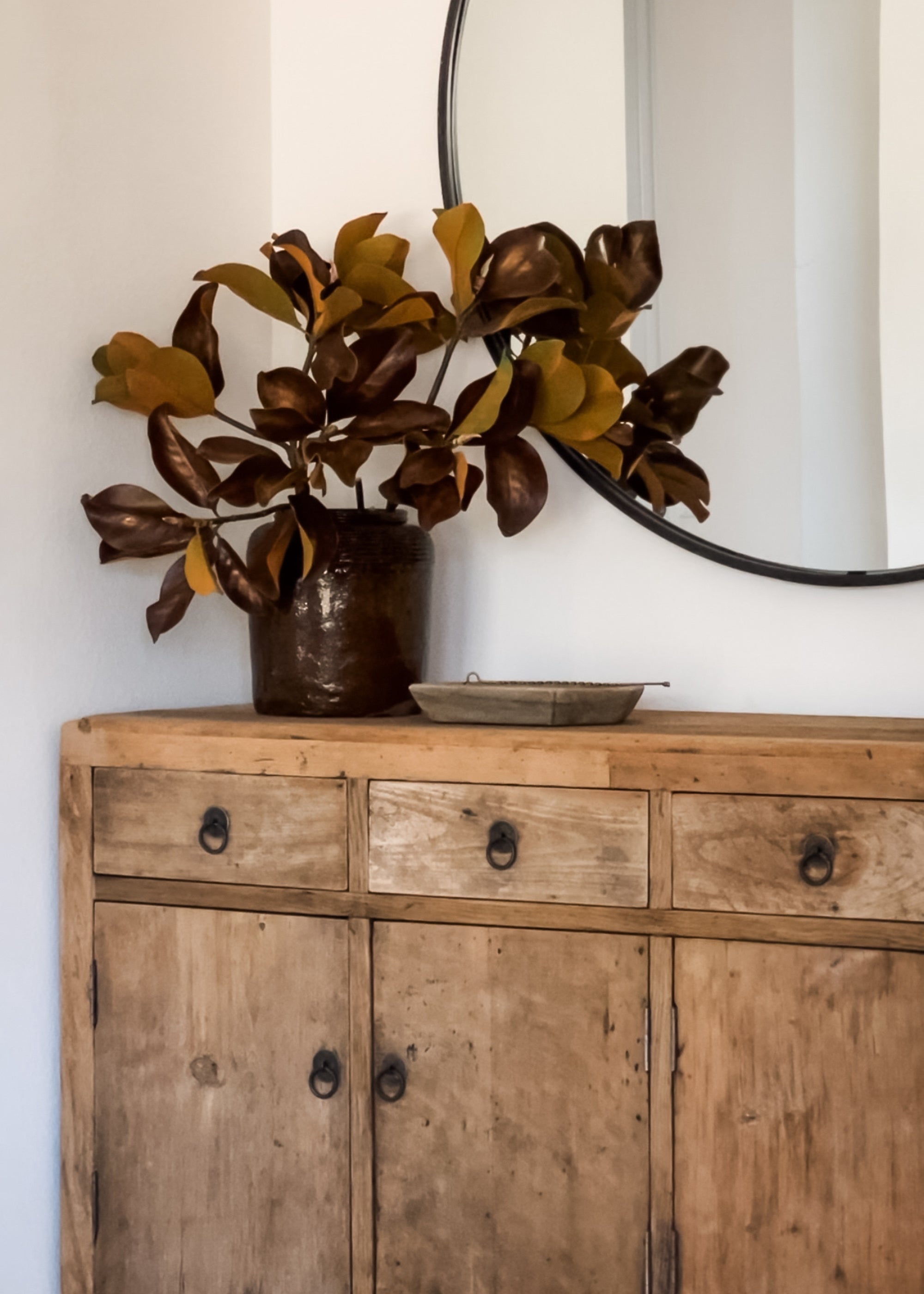 Artificial Magnolia Leaves Styled on Console Table