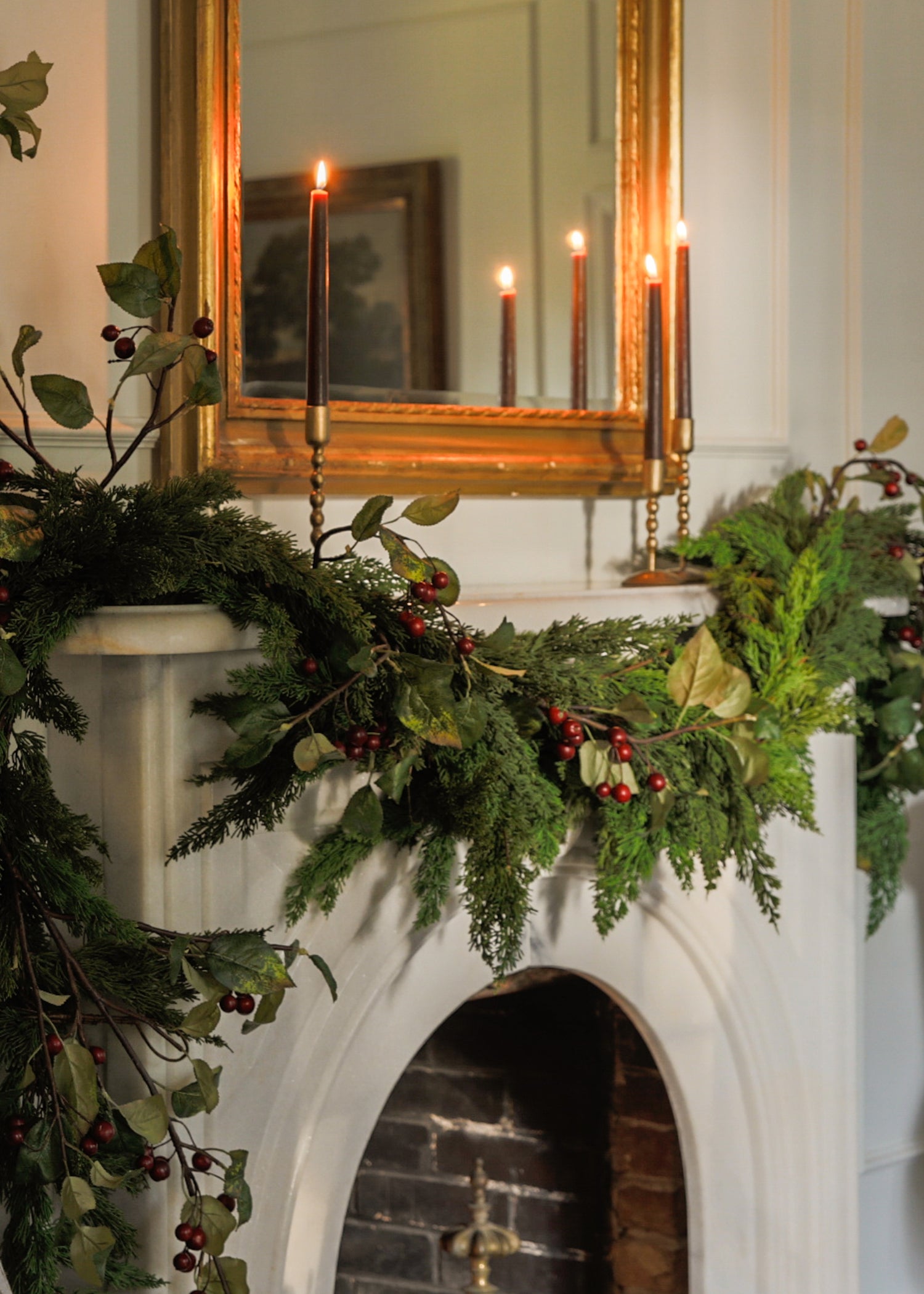 Holiday Mantel with Candles and Cedar Garland