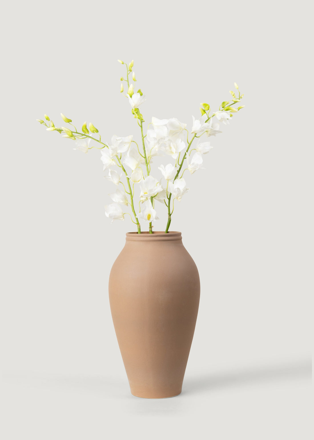 Faux Orchids Arranged in Vase