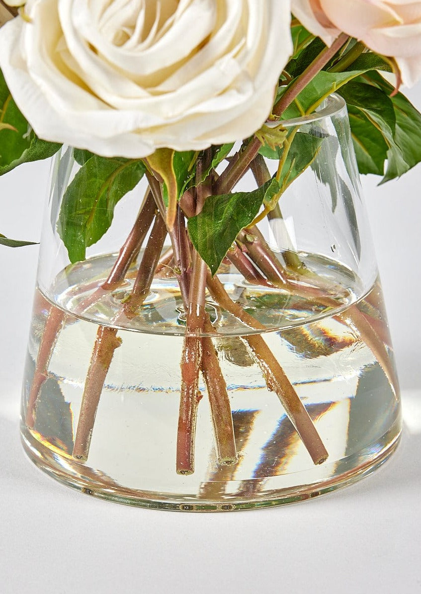 Close Up of Acrylic Water in Glass Vase Flower Arrangement