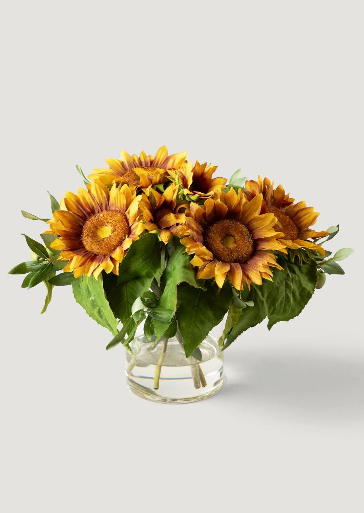Luxe Fall Decor Faux Sunflower and Olive Leaf Arrangement in Glass Vase