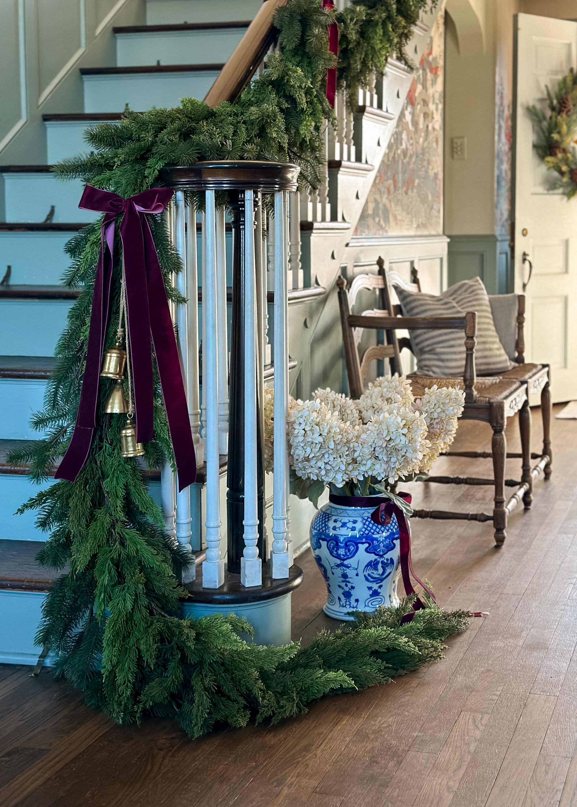 Cedar Garland on Stair Rail